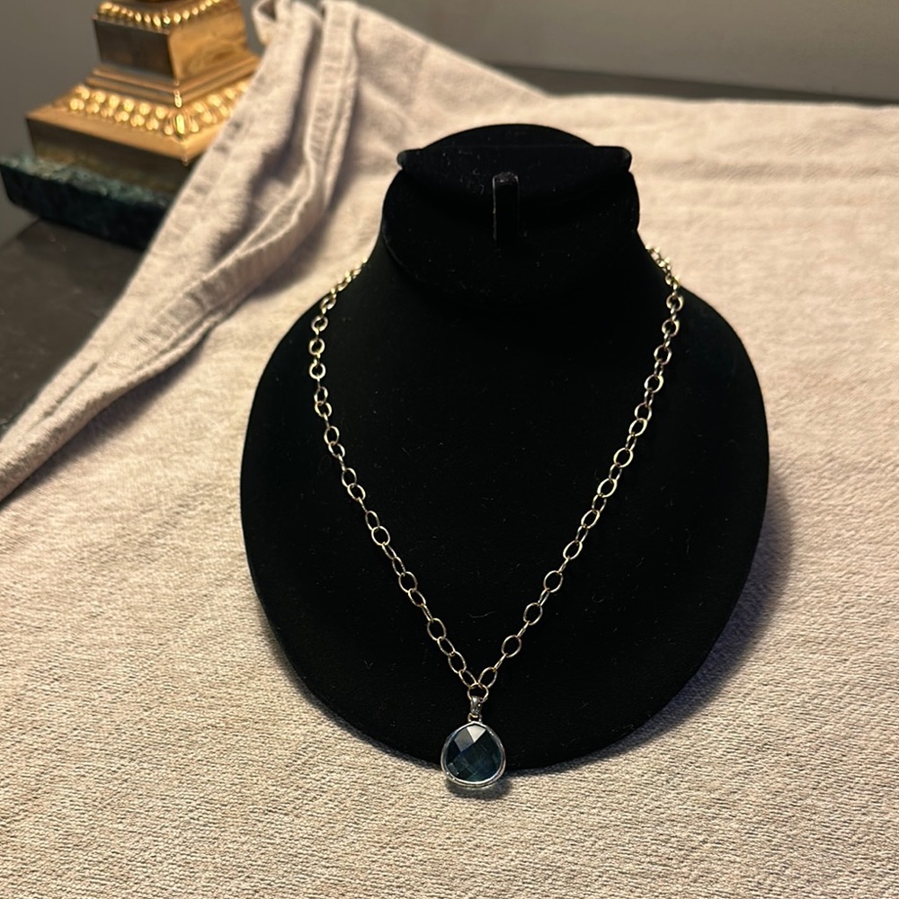 Elegant Silver and Gold Necklace with Blue Pendant